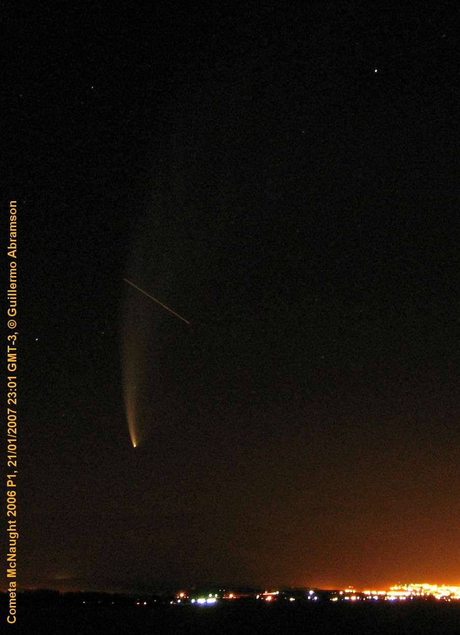 MacNaught comet photographed with trail of ISS: 82 KB
