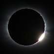 Diamond ring of total eclipse photographed from Fær Øer (Denmark) by Carlo and Chiara Dellarole: 1.046 KB