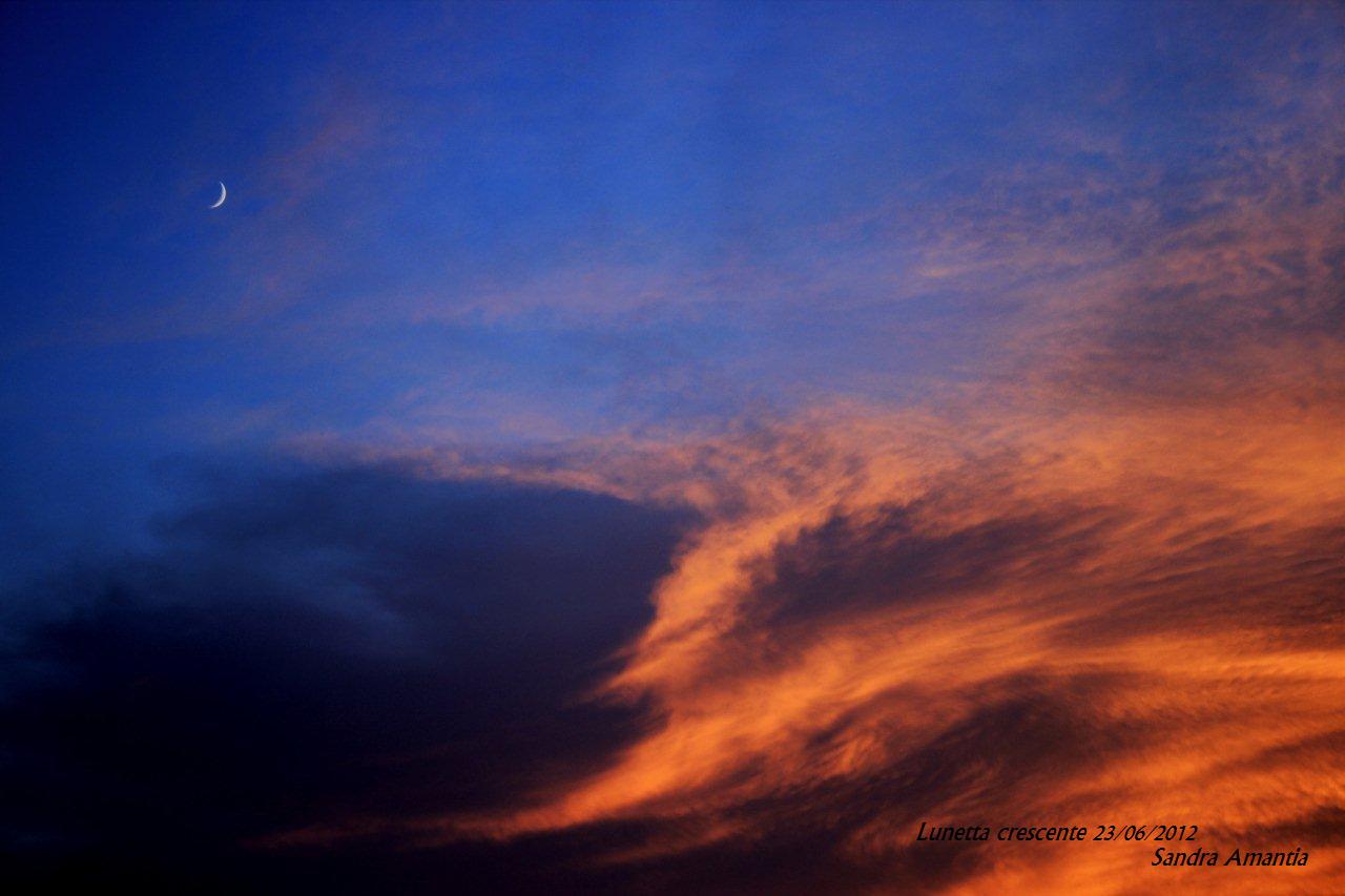 Sunset with Moon near clouds: 85 KB; click on the image to enlarge